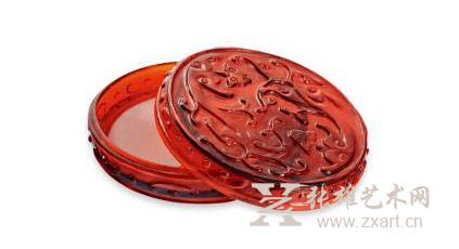    Lot 443 清中期 宝石红料螭龙纹香盒 径8cm 估价：150,000 - 200,000 RMB