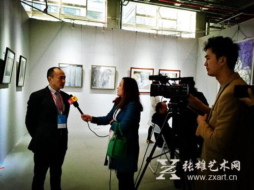 何磊先生接受广州电视台采访